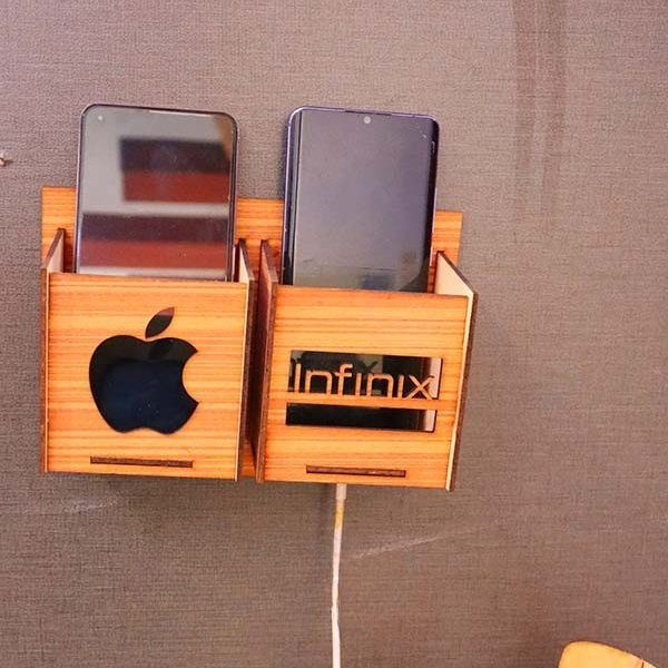 71722253e4558ce7c39382b66d92ad1d Wall Mounted Wooden Mobile Charging Holder – Phone & Charger Organizer for Home & Office - Image 2