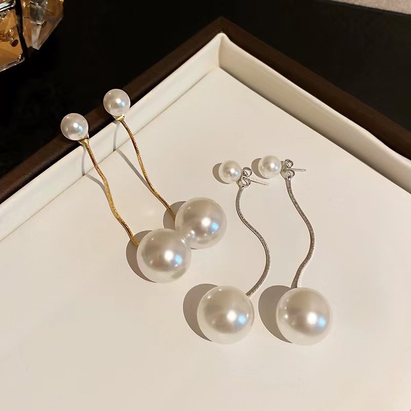 74fcba56bb5866d2d1a5d3b942a8e857 AWJ-157 Elegant Pearl Hanging Korean Earrings – Stylish, Lightweight & Trendy Fashion Jewelry for Women - Image 2