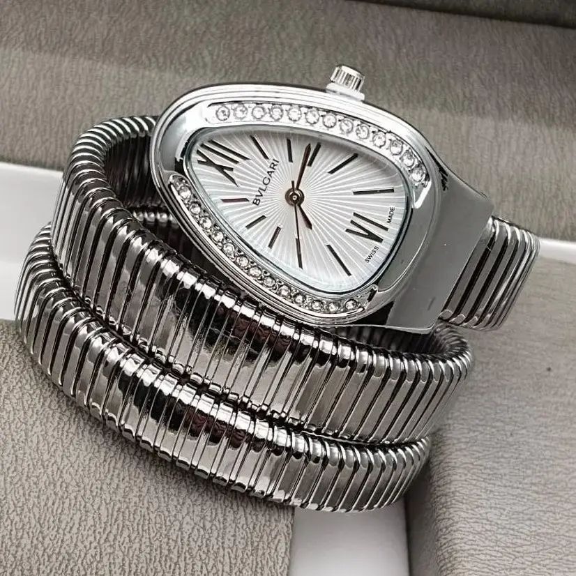 8bb4cc0a0dfcd709466a9e315b072d15 Triple‑Wrap Snake Watch | Diamond‑Set Bezel | Luxury Fashion Accessory