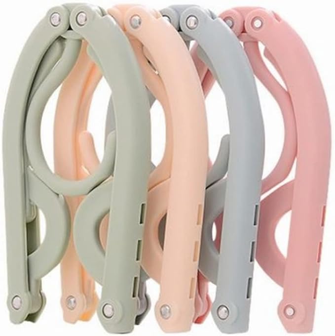 9970584a42664556b2d30f99d661e068 Portable Folding Clothes Hangers with Slots – Pack of 10 Durable Travel-Friendly Hangers. ( Random Colour ) - Image 2