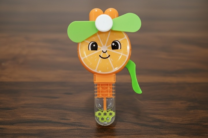Gemini_Generated_Image_tzvcdktzvcdktzvc_cleanup Handheld Fruit Shape Toy Fan for Kids – Cute Cartoon Design, Safe Soft Blades, Portable Mini Fan for Summer Play & C - Image 2