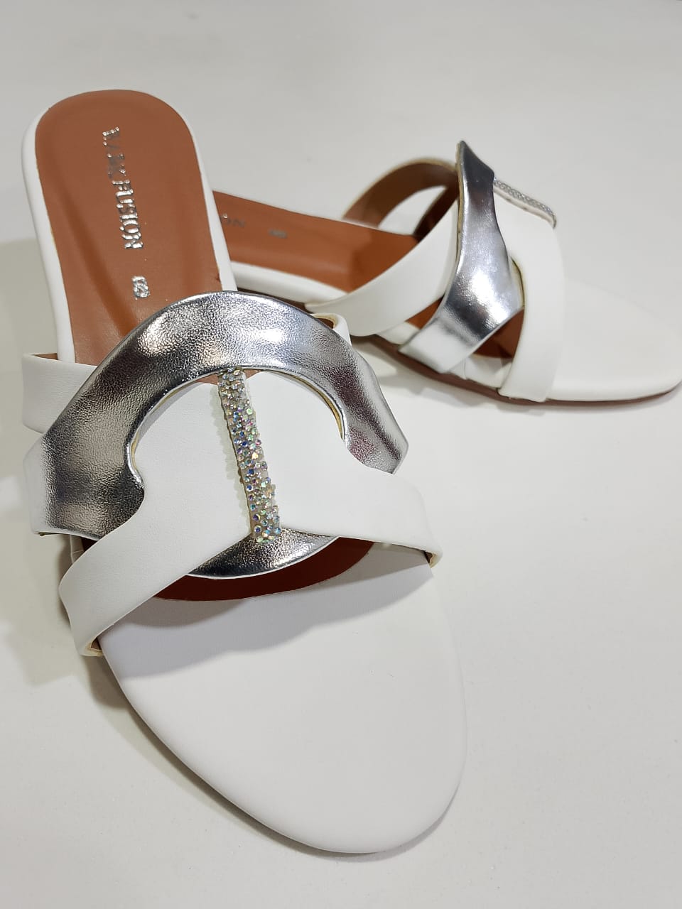 WhatsApp-Image-2025-07-17-at-1.47.47-AM White & Silver Premium Slippers – Elegant Design, Comfy Feel & Stylish Look | Shine with every step — comfort, e - Image 4
