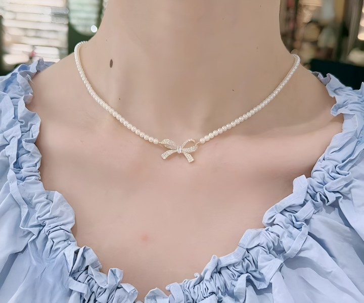WhatsApp-Image-2025-08-22-at-95121-AM_cleanup-Picsart-AiImageEnhancer_cleanup PQT-992 - Bow Shape Pearl Pendant Necklace for Women – Dainty Jewelry with Sparkling Bow Design | Available in Silver &a - Image 4
