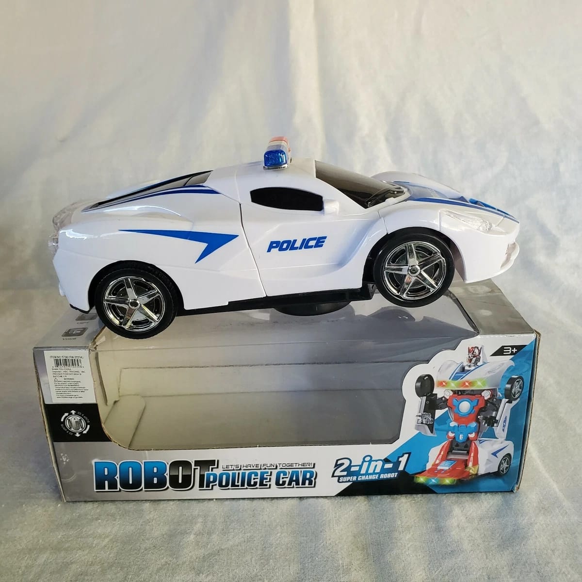 WhatsApp-Image-2025-08-26-at-4.55.59-PM-1 Robot Police Car Toy – Transformer with Lights, Music, Automatic Rotation & Bump-and-Go Movement, Brain Development