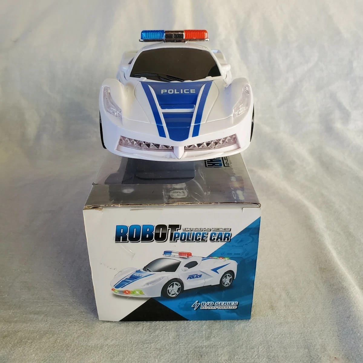 WhatsApp-Image-2025-08-26-at-4.56.00-PM Robot Police Car Toy – Transformer with Lights, Music, Automatic Rotation & Bump-and-Go Movement, Brain Development - Image 3