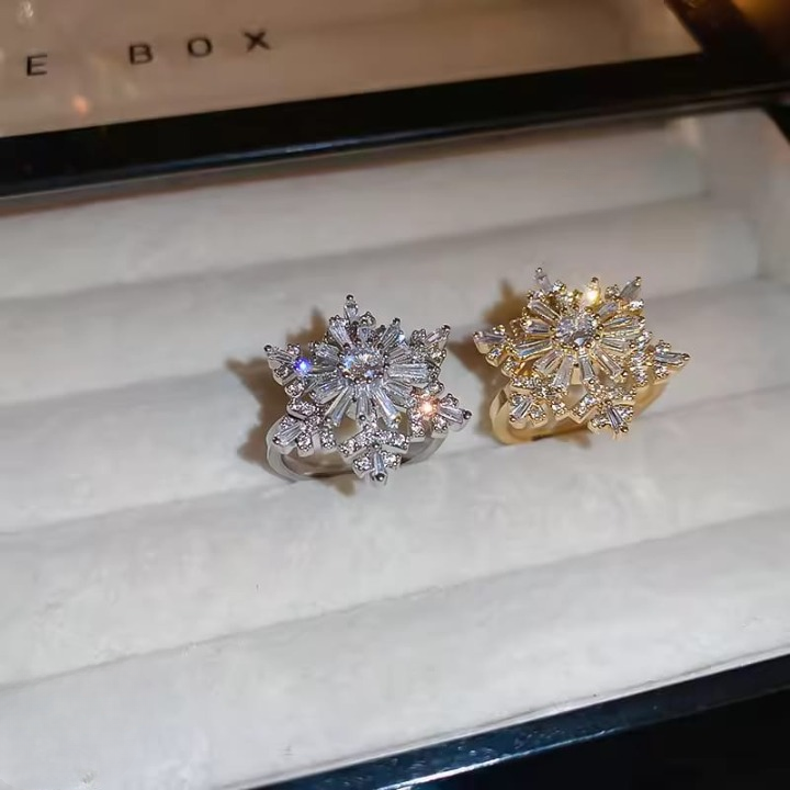 WhatsApp-Image-2025-08-26-at-5.14.21-PM_cleanup Sparkling Flower Rotating Ring – Adjustable Elegant Spinning Ring for Women & Girls, Fashion Jewelry (QUJ-109 )