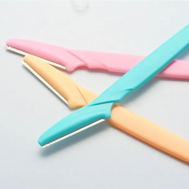 ae54452e0aa4a806ef9c3a2a389a45c2 Pack of 3 Tinkle Eyebrow & Facial Hair Razor for Women - Image 2