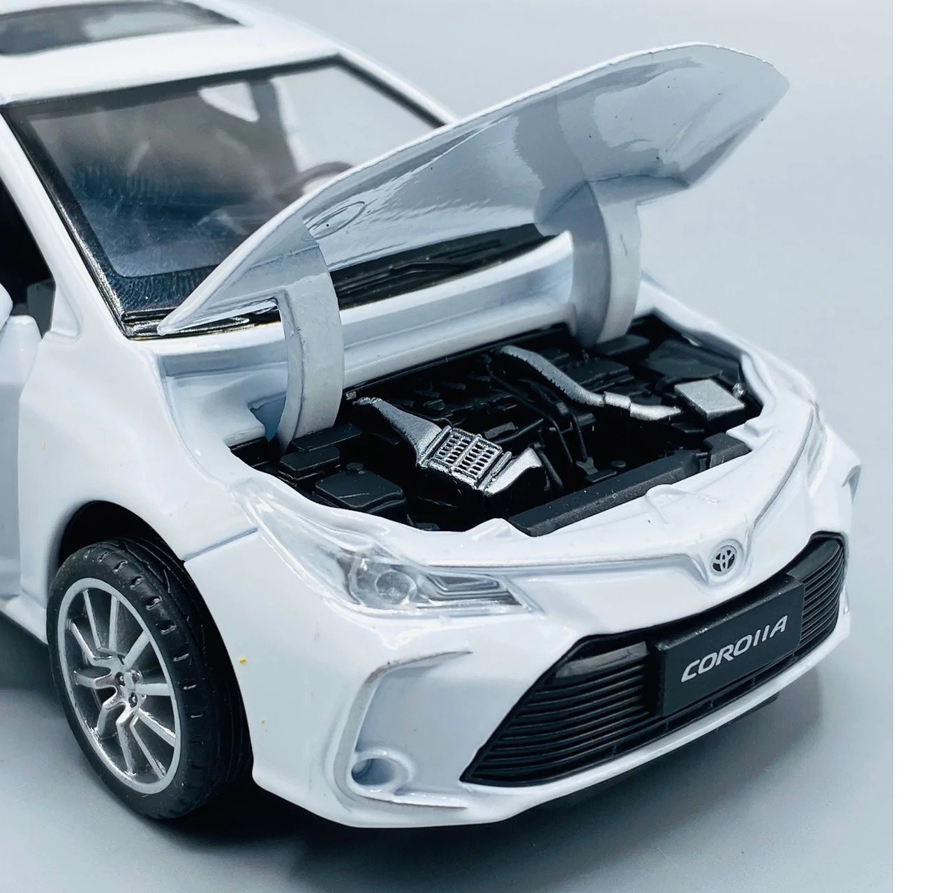 b86f2edb4a2b27bf40570a88c40a7f5e Corolla Toy Car with Smart Sensor Touch High-Quality Kids Toy Vehicle (Random Colors Available) - Image 3