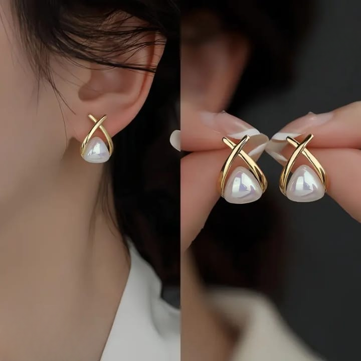 c2add8dde63a40dc3ec11f3f220cf603 Trendy Korean Cross Pearl Earrings – Sculpted Design (AVT-114) - Image 2