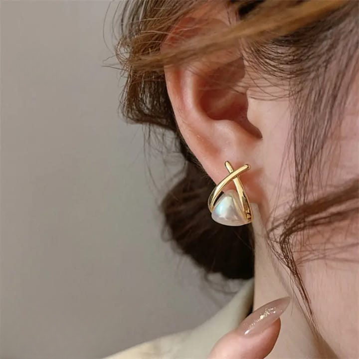 c8c5434e9687015e25ed337f8b51df87 Trendy Korean Cross Pearl Earrings – Sculpted Design (AVT-114)
