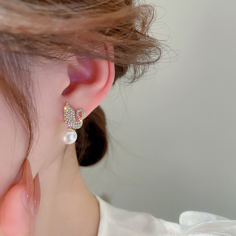 c92299dbb5461fde6ddcaa9299b11759 ZJE-911 Swan Pearl Earrings – Elegant Korean Style Jewellery , Stylish Accessory for Women - Image 2