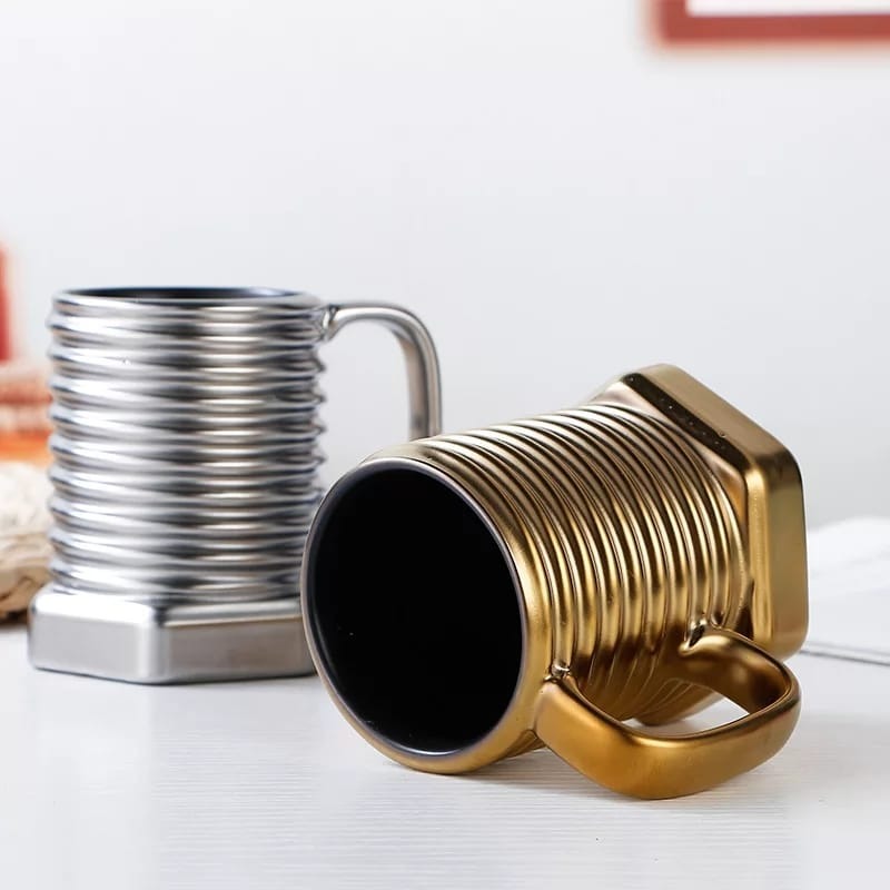 f1dbfb8d9b2175bcc68de90352feca3b Screw Shape Ceramic Coffee Mug: Unique 3D Porcelain Tea Cup with Sculptural Twist Design. - Image 2