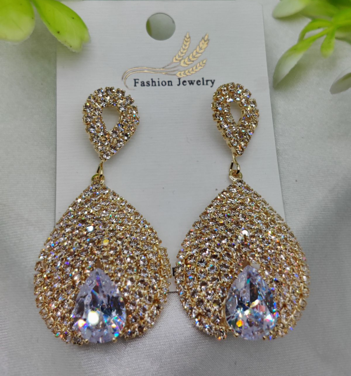 Luxurious Teardrop Crystal Earrings with Pave Detailing Earrings - Luxurious Gold Finish | Best Quality Artificial Earri